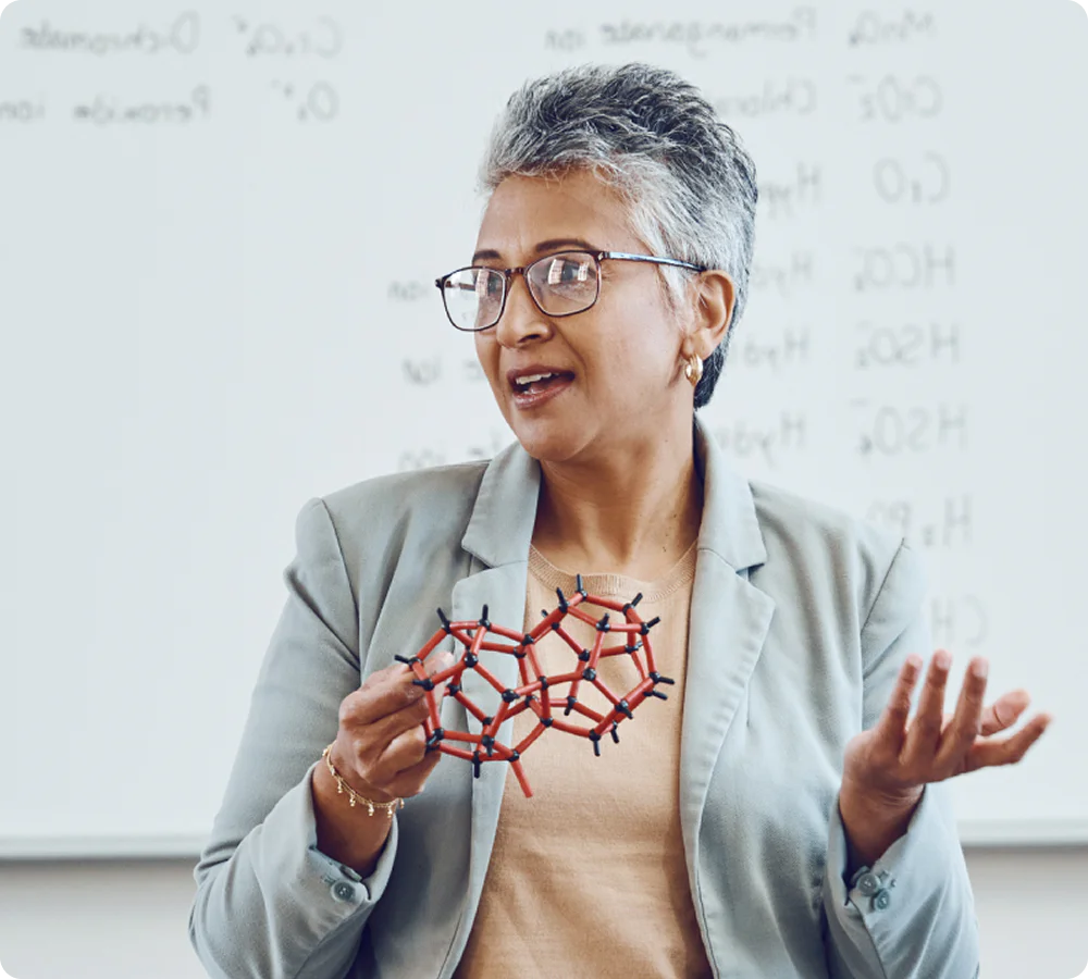 Teacher Explains Molecular Structure in Science Class