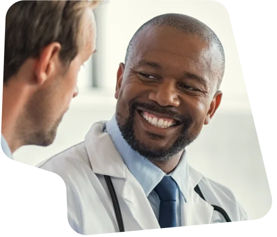 Friendly Conversation Between Two Healthcare Professionals
